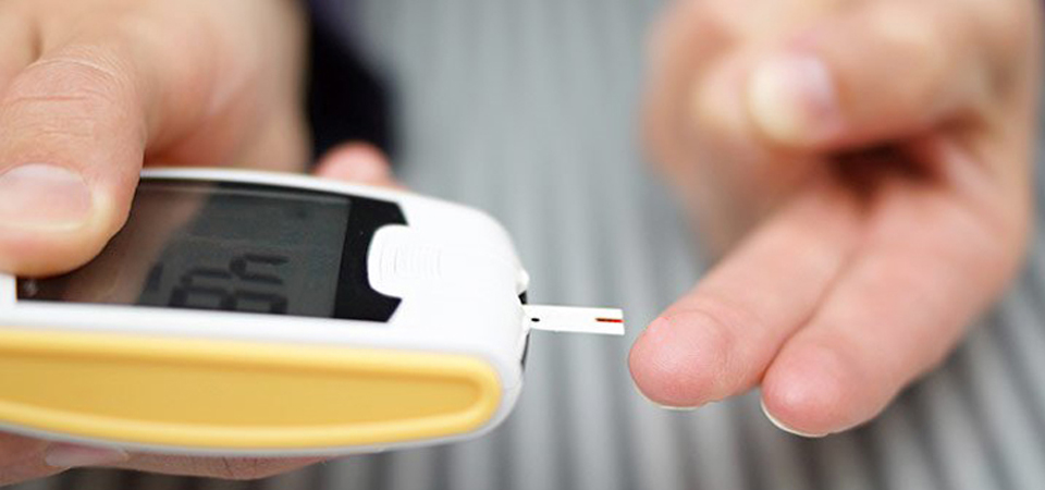 Person reading food labels in a supermarket